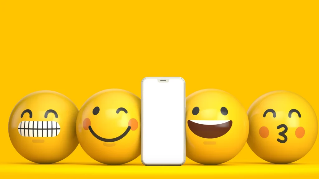 Téléphone entouré de smileys