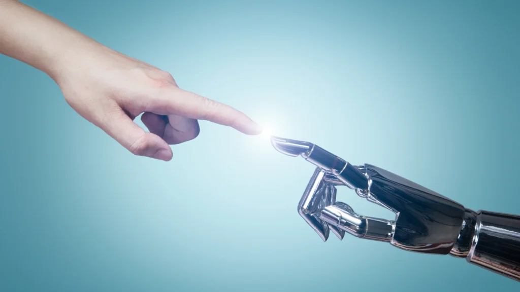 Interaction entre une main humaine et une main robotique symbolisant l’utilisation ChatGPT
